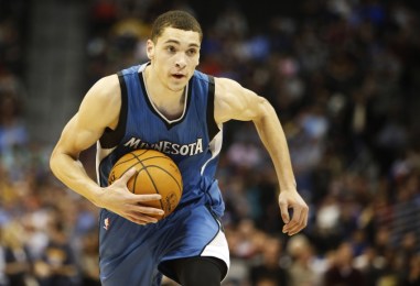 Dec 26, 2014; Denver, CO, USA; Minnesota Timberwolves guard Zach LaVine (8) runs the ball down the court during the second half against the Denver Nuggets at Pepsi Center. The Nuggets won 106-102. Mandatory Credit: Chris Humphreys-USA TODAY Sports
